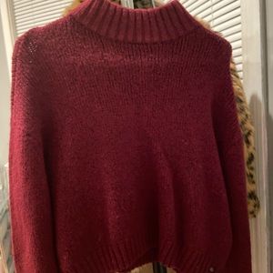 Burgundy knitted turtleneck sweater